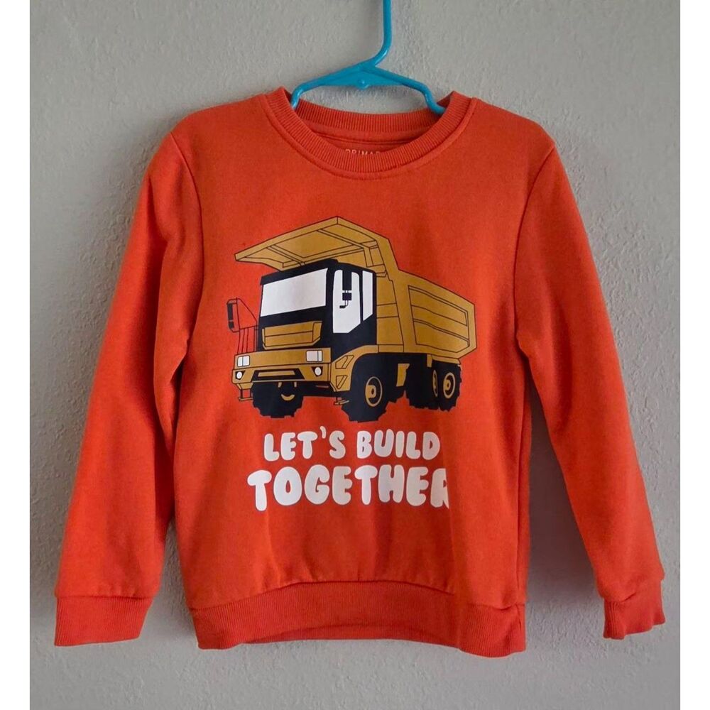 orange cotton pullover with yellow truck design size 5-6 yo